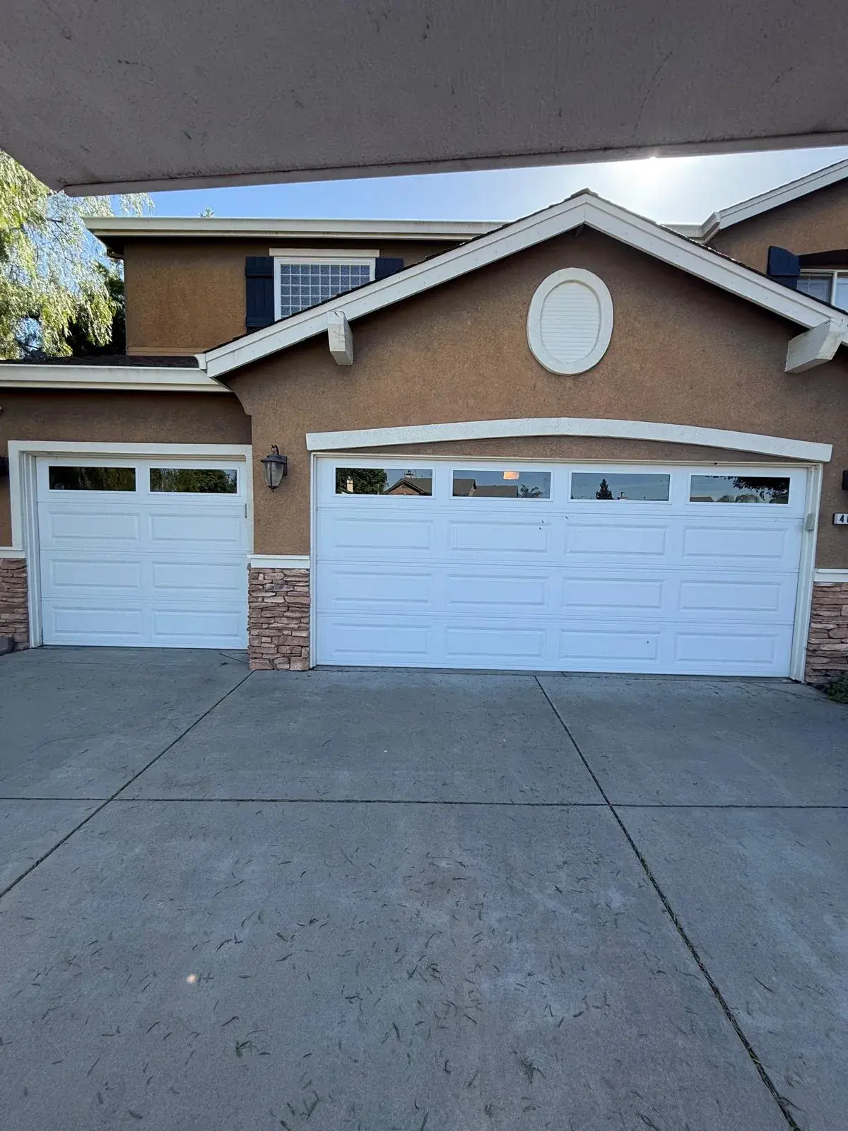 C.H.I. Model 4250 Garage Door with Long Panel Clear Glass Windows — Window top-section configuration, natural-light upgrade, spring balance, opener compatibility check. Product: C.H.I. Model 42 — apro