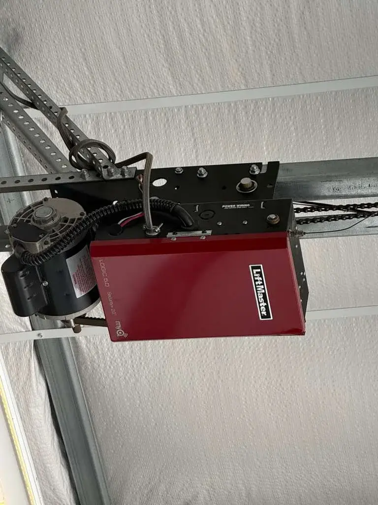 Commercial liftmaster logic 5 hoist operator installation — Commercial opener installation, chain hoist operation, travel limit setup, safety device verification, door balance inspectio — aprofessiona