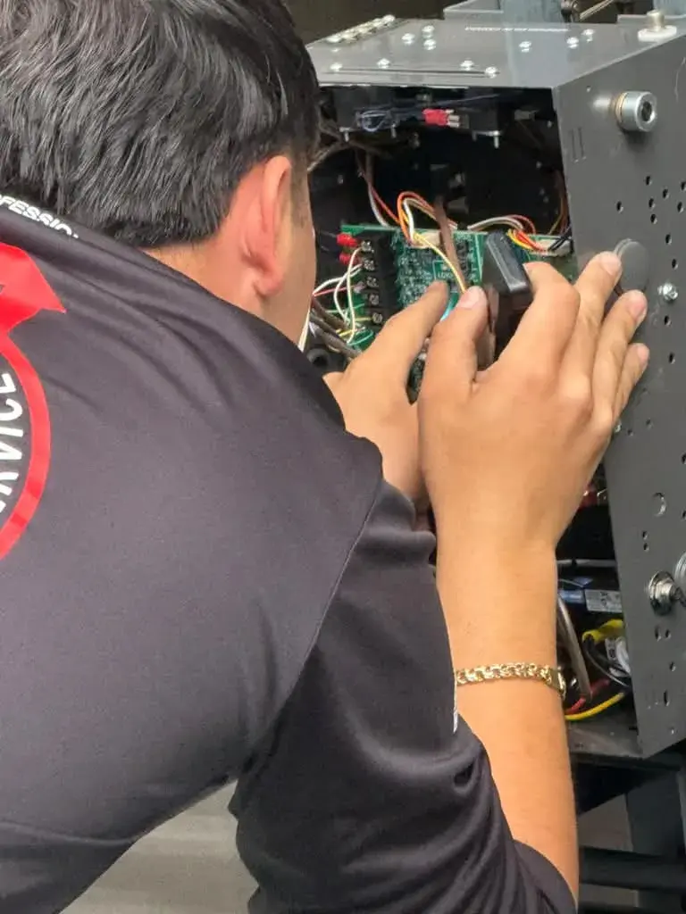 Escalón Fire Department, California - Motor Reprogramming, Wall Control Installation, Remote Programming, and Service for Six 12x14 Doors — Motor reprogramming, wall control installation, remote progr