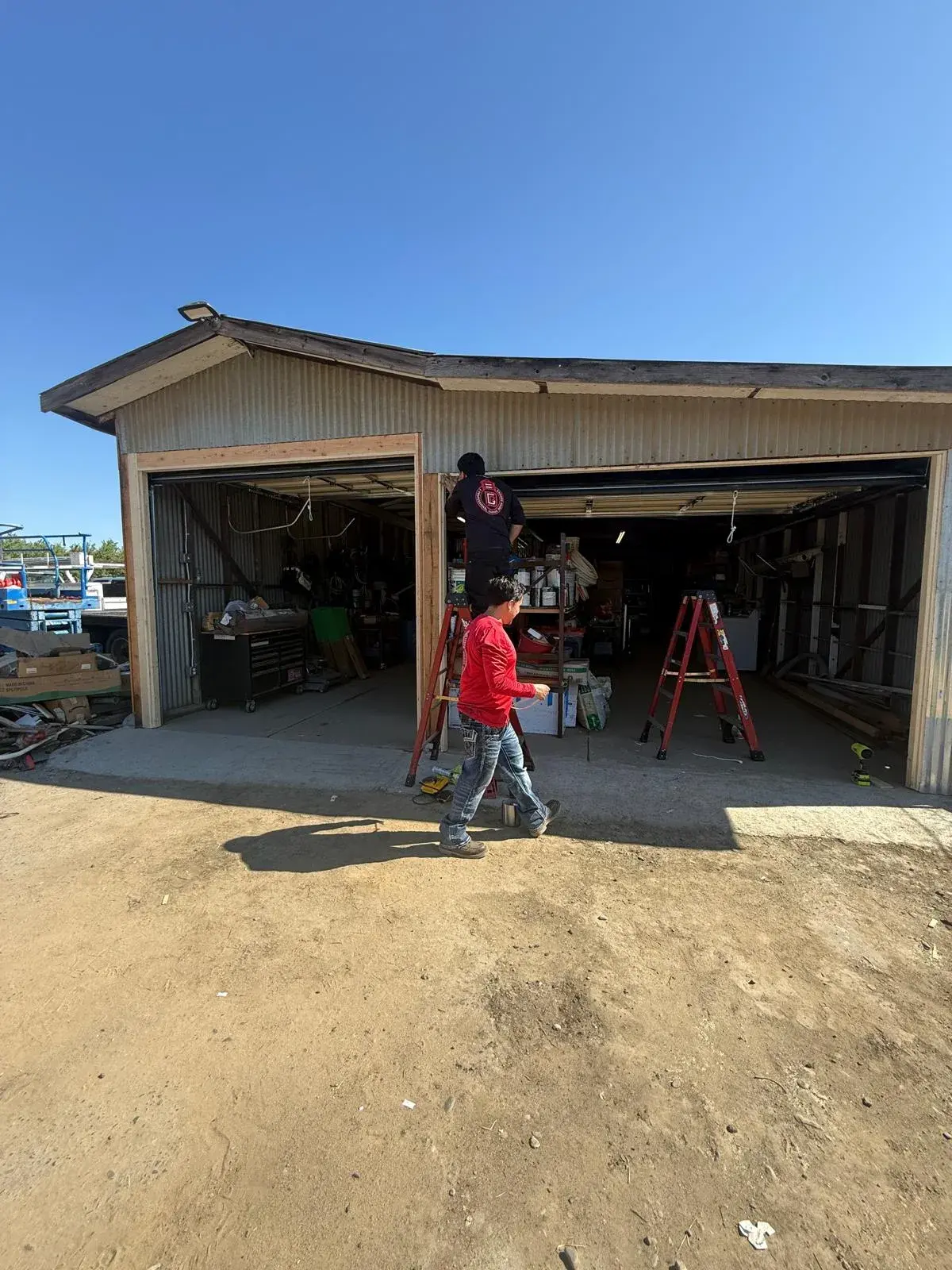 Framing a Garage Opening for Special-Size C.H.I. Model 2250 Doors — Framing preparation, opening verification, door installation, track setup, balance testing. Special-size 9'6" x 8'6" C.H.I. M — apro