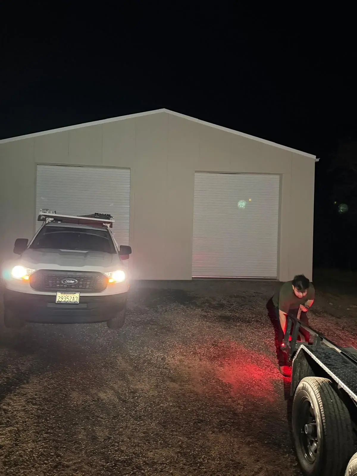 Four 12x14 Insulated Janus Roll-Up Doors for a Custom Metal Building — Multi-opening measurement, guide and barrel installation, insulated curtain setup, seal verification, final testing. Product/ — a