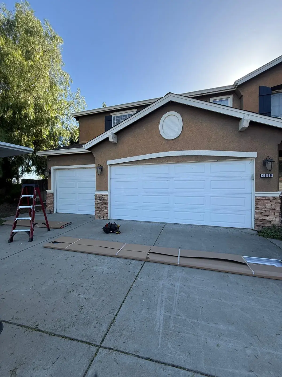 C.H.I. Model 4250 Garage Door with Long Panel Clear Glass Windows — Window top-section configuration, natural-light upgrade, spring balance, opener compatibility check. Product: C.H.I. Model 42 — apro